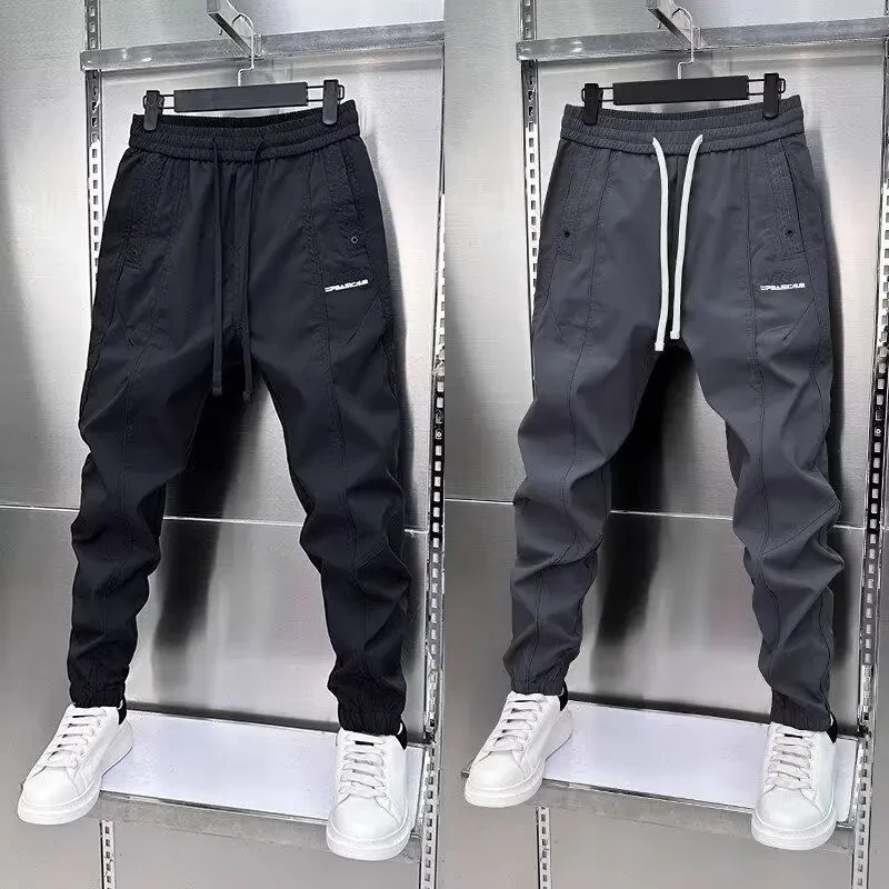 秋冬季新款男士拼接束脚休闲裤弹力松紧腰修身小脚裤刺绣纯色百搭