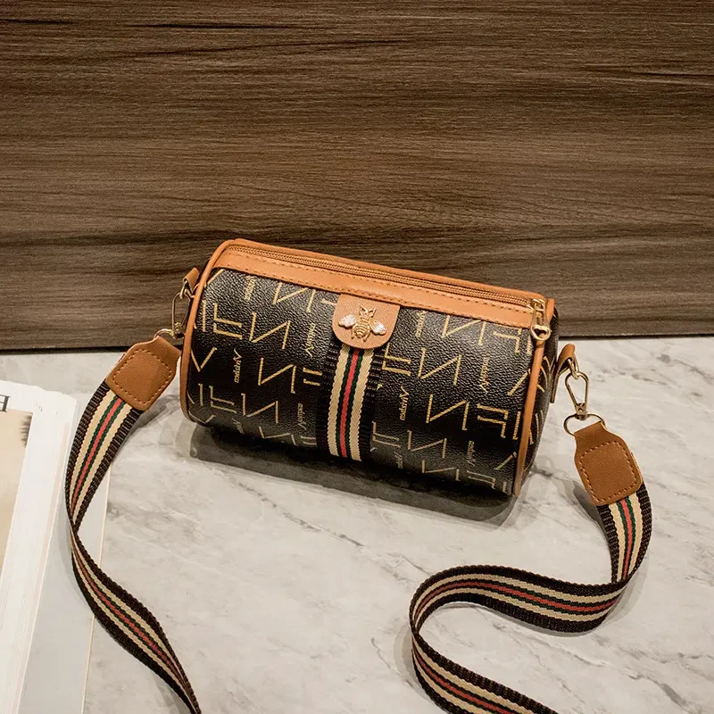 新圆筒型小圆包时尚女式单肩包印花斜挎枕头包美甲工具收纳包