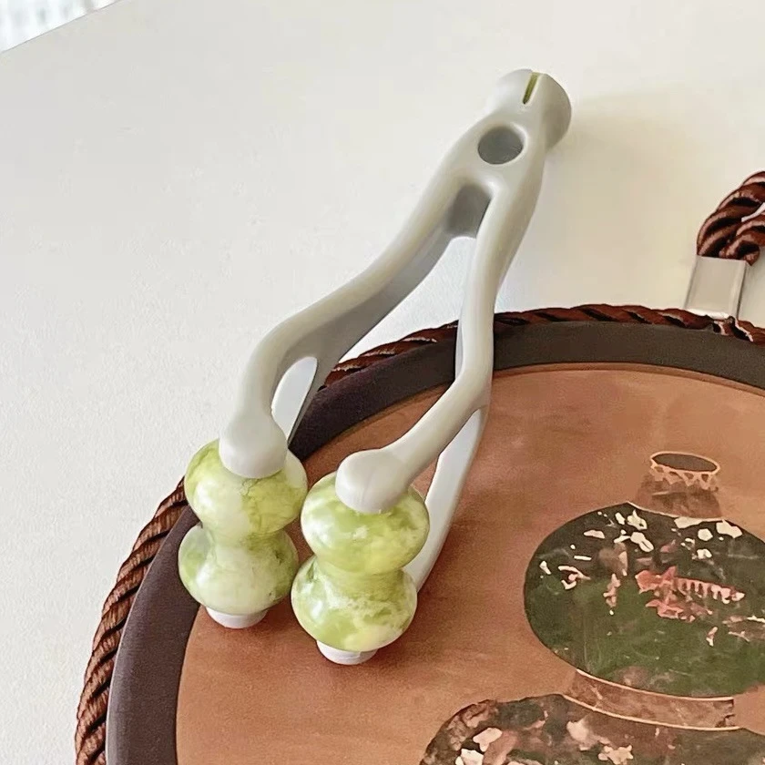 玉石手指按摩器手部关节自动位刮滚轮神瘦器细长多功能经络神器