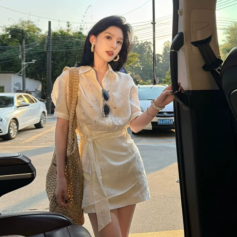 法式纯欲风不规则镂空短袖连衣裙女2025夏季荷叶边钩花衬衫裙子潮