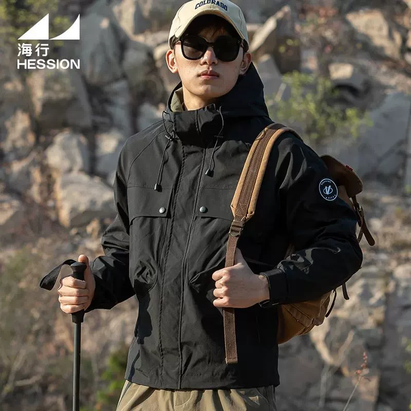 海行黑色户外三防机能夹克男2025秋季新款徒步登山插肩连帽外套