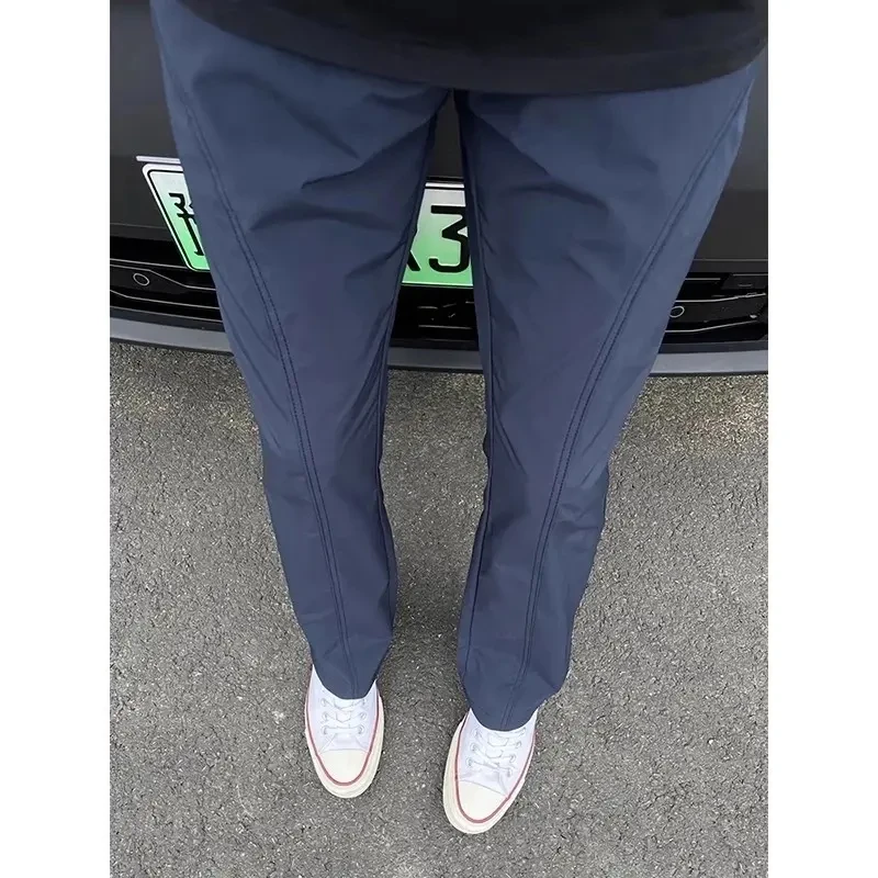 户外斜切冲锋裤男秋冬加绒款透气速干冰丝裤子美式微喇显瘦工装裤