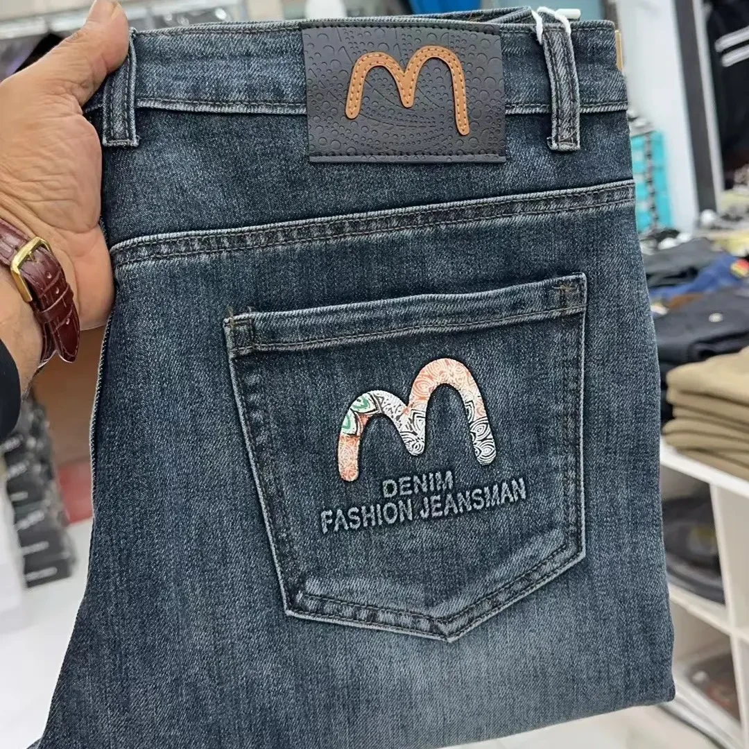 男士刺绣针缝水洗秋冬牛仔裤修身小脚百搭弹力长裤