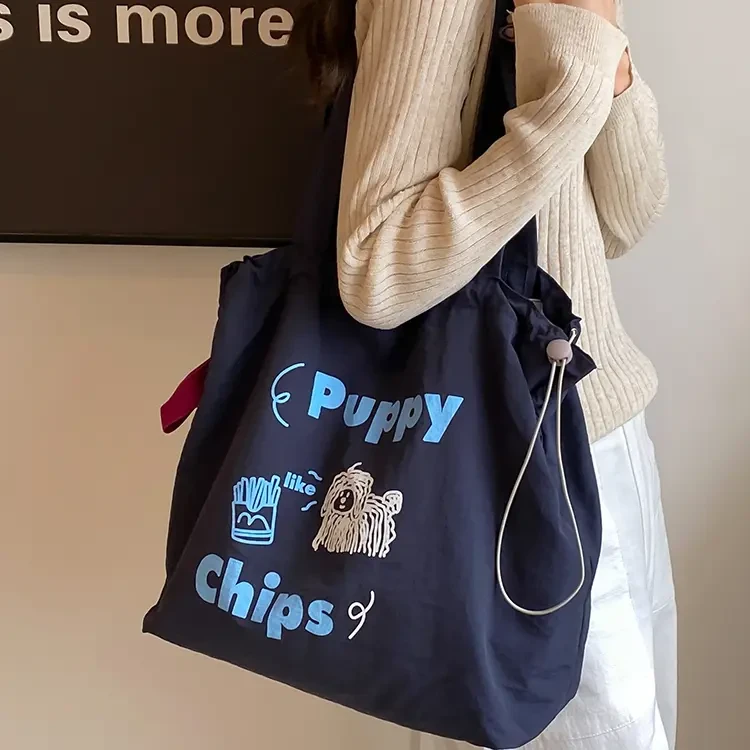 慵懒风韩版抽绳字母印花帆布包大容量托特包休闲学生上课购物袋女