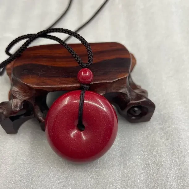 含辰砂工艺品含辰砂工艺品天然朱砂紫金砂平安扣吊坠转运护身