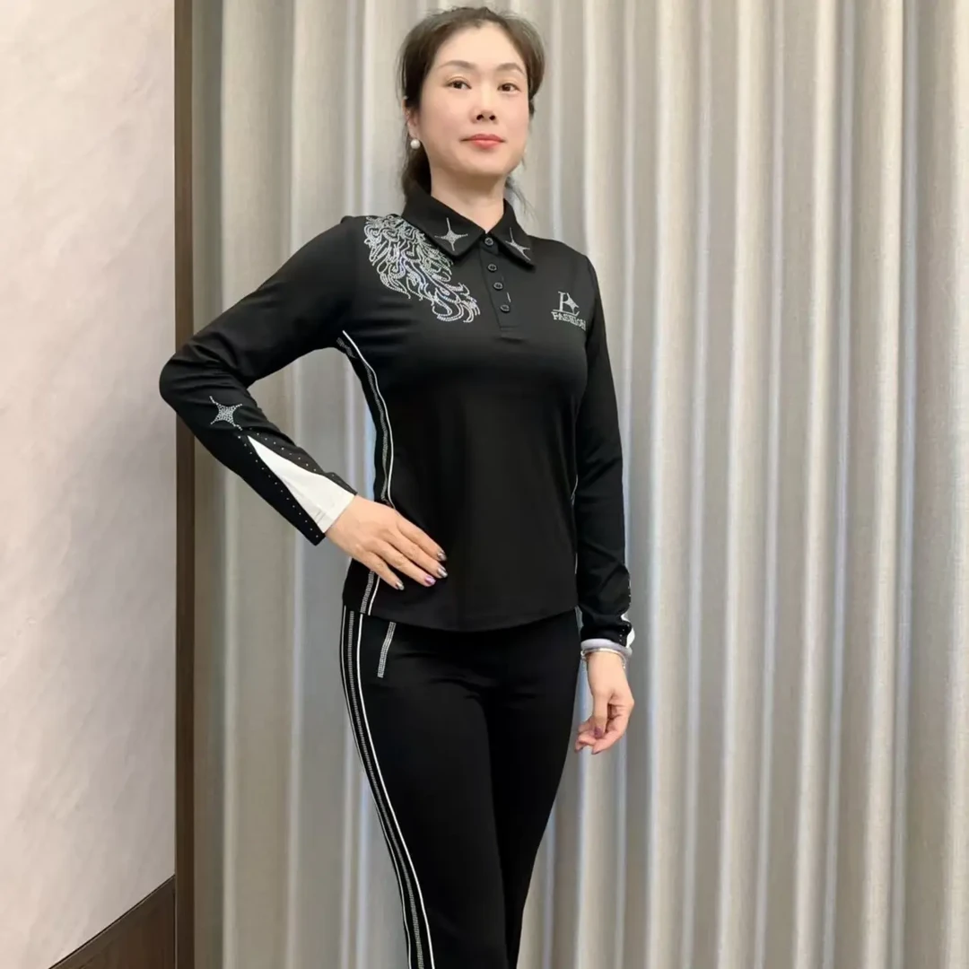 新款佳木斯健身操黑色高弹力镶钻孔雀长袖套装显瘦时尚