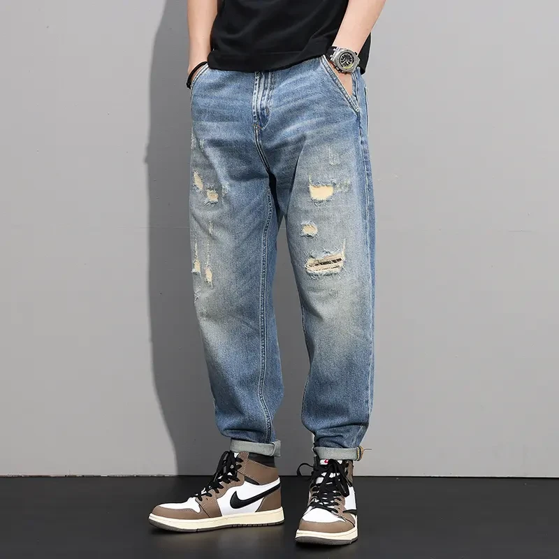 春夏新款破洞牛仔裤男款宽松百搭微弹做旧户外哈伦牛仔裤爆款男裤