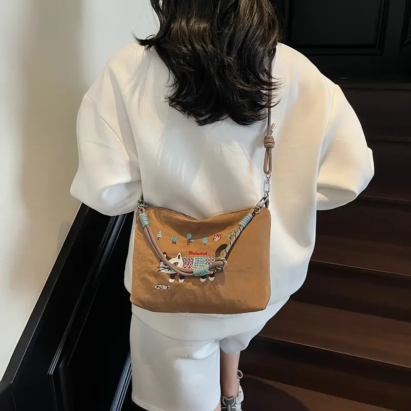 大容量春夏猫咪刺绣包防水手提斜挎包单肩包购物袋卡通尼龙包包女