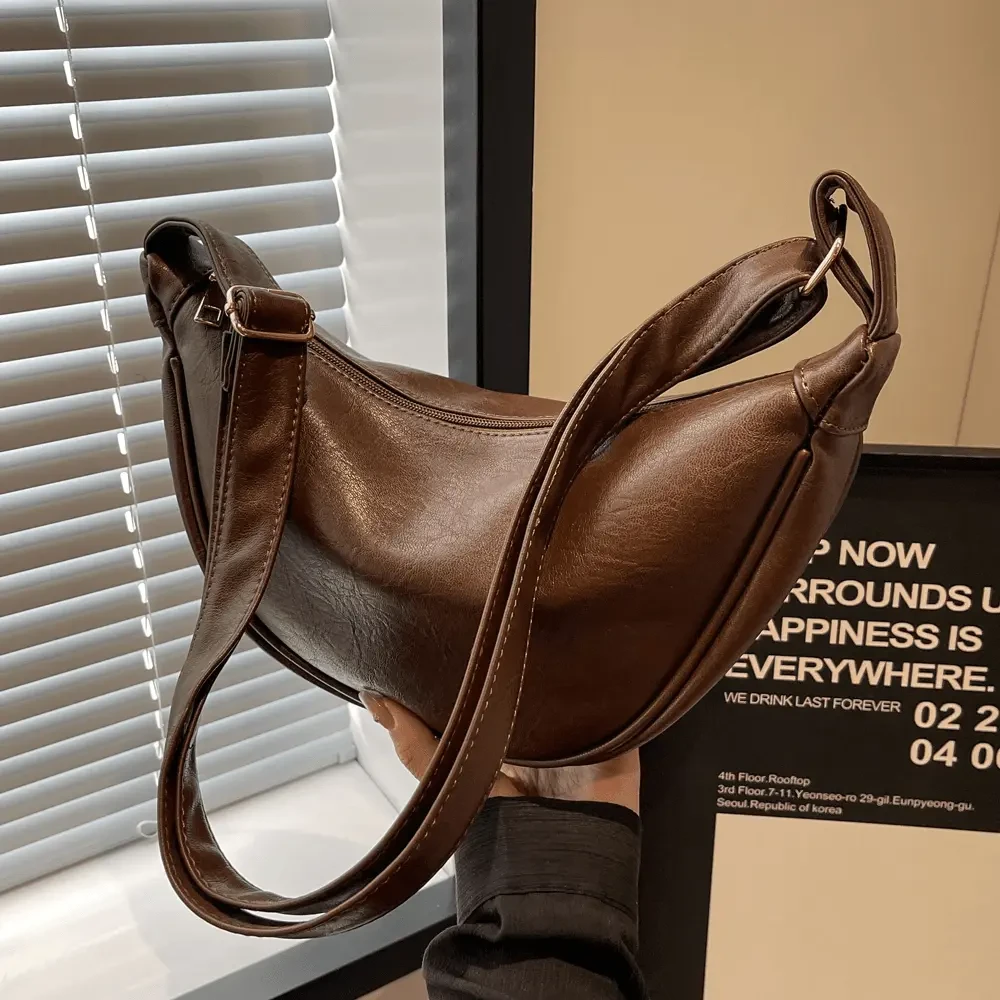 包包女斜挎包2025新款春夏款大容量小众设计高级感复古单肩饺子包