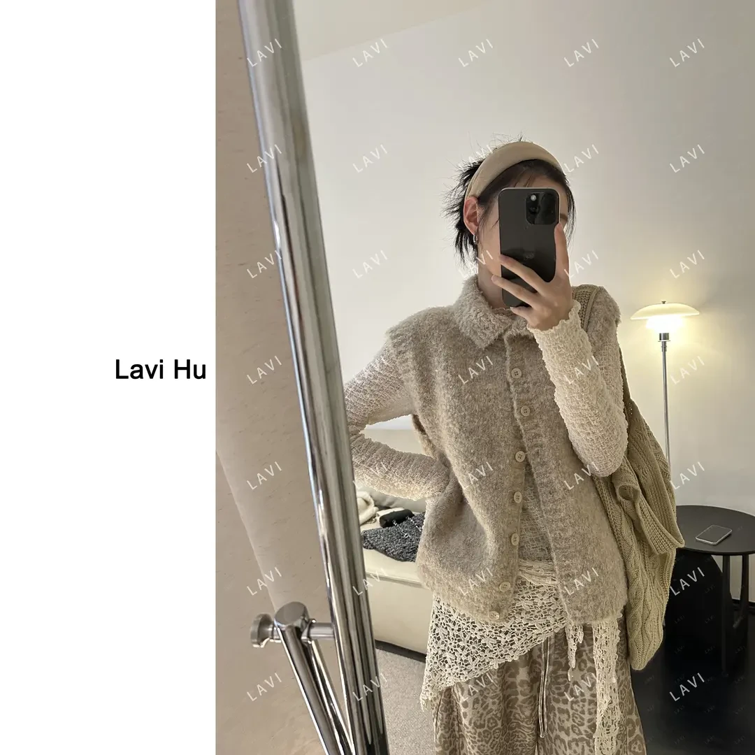 时尚高级感单排扣高领针织马甲女秋冬新款休闲外搭叠穿毛茸茸背心