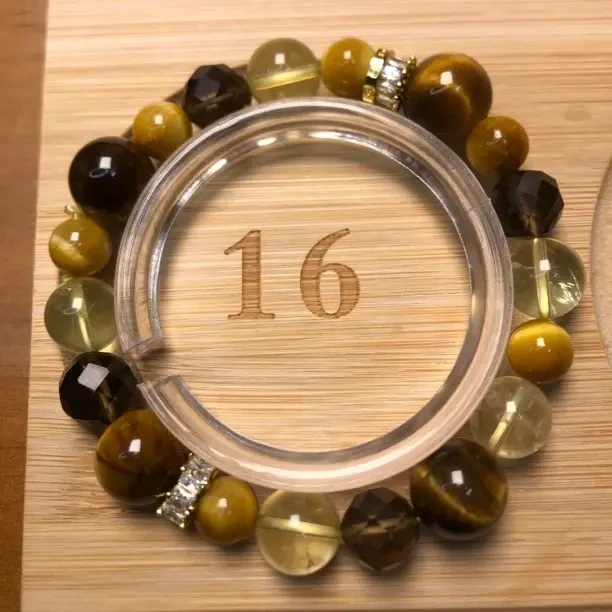 金霸综合天然黄水晶虎晶手串