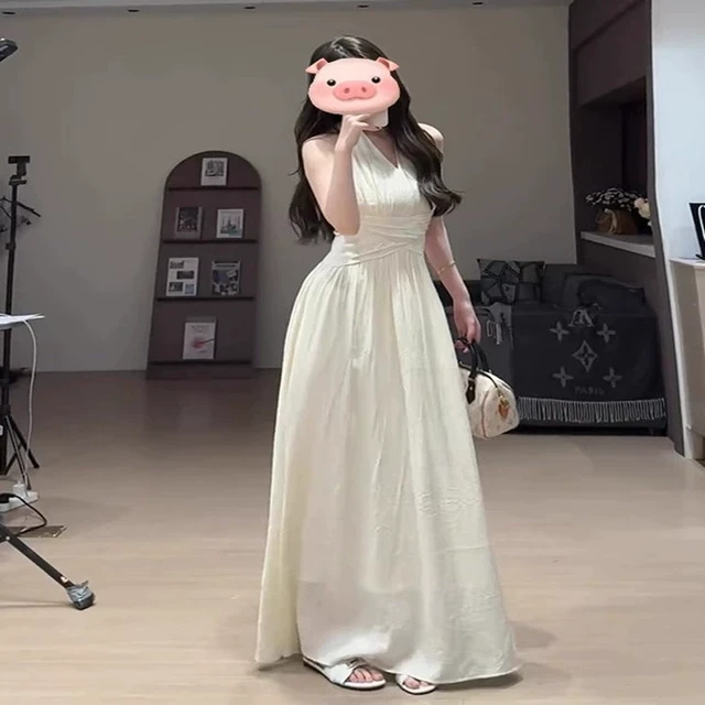 赫本风白色v领挂脖连衣裙子女夏季新款法式气质收腰无袖吊带长裙