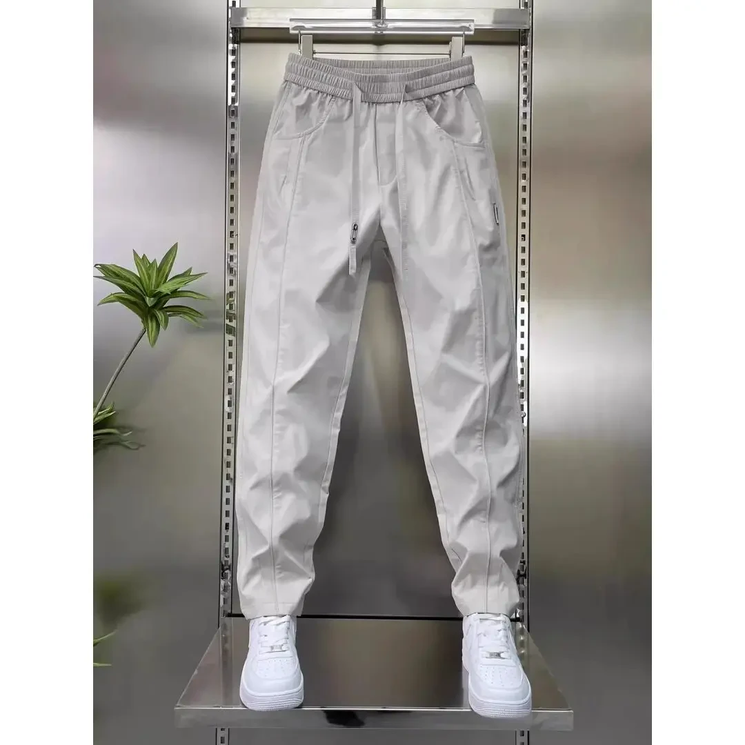 【时尚精选】秋冬2025新款运动休闲裤男纯色拼接时尚宽松弹力冲锋裤