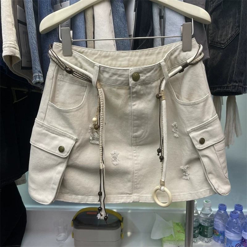 破洞工装杏色酷辣风牛仔半身裙防走光高腰百搭a字短裙