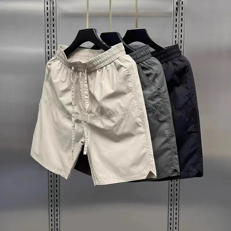 夏季新款激光打孔透气休闲短裤男锦纶速干凉男士夏季美式锦纶短裤