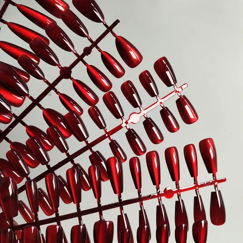 新年酒红车厘子美甲猫眼穿戴甲显白醒狮短款长水滴红绒蝴蝶结KT猫