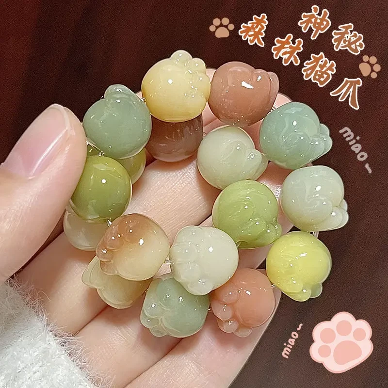 猫爪菩提手串天然菩提手串多宝色菩提绕指柔精工雕刻猫爪菩提手串