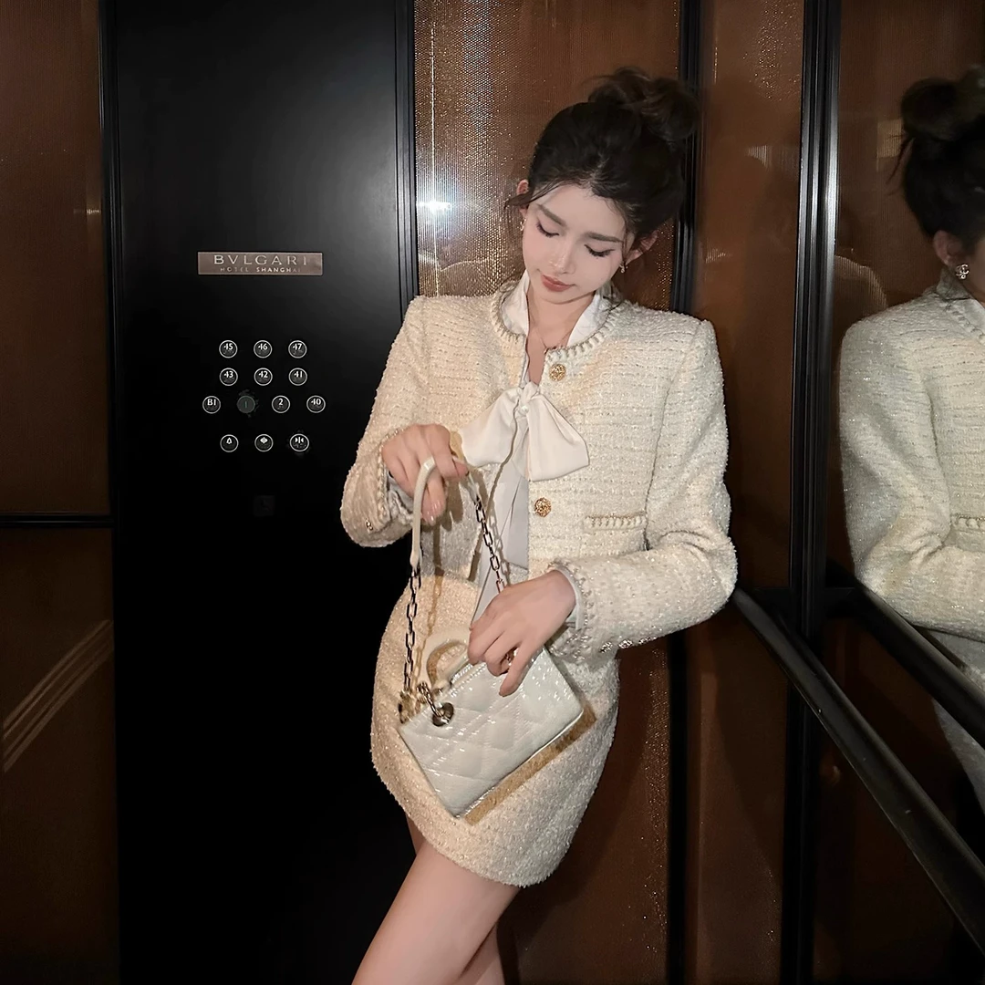 “All white铂金山茶”羊毛亮丝粗纺花呢 早春精致款小香外套半裙