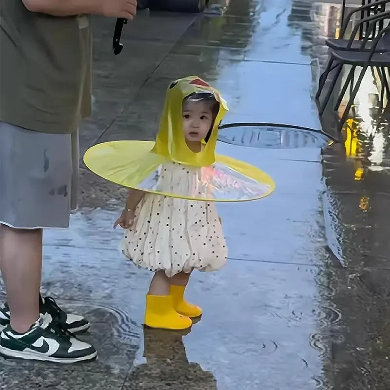 小黄鸭飞碟雨衣小孩斗篷式雨伞帽幼儿园宝宝儿童雨衣连体雨披W167