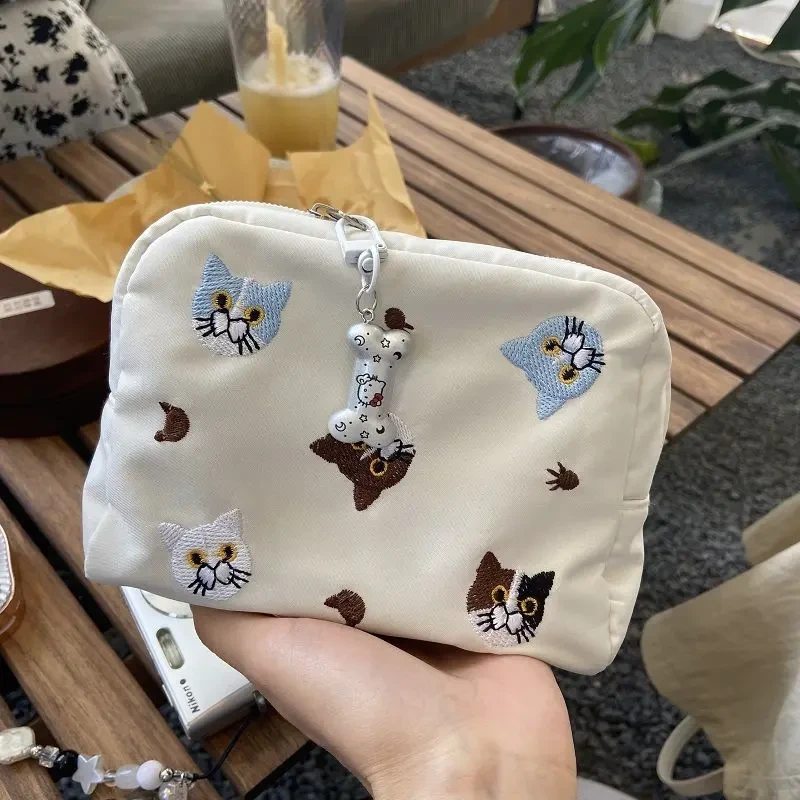 可爱猫咪刺绣化妆包精致收纳包月事包手拿口红气垫便携式旅行包