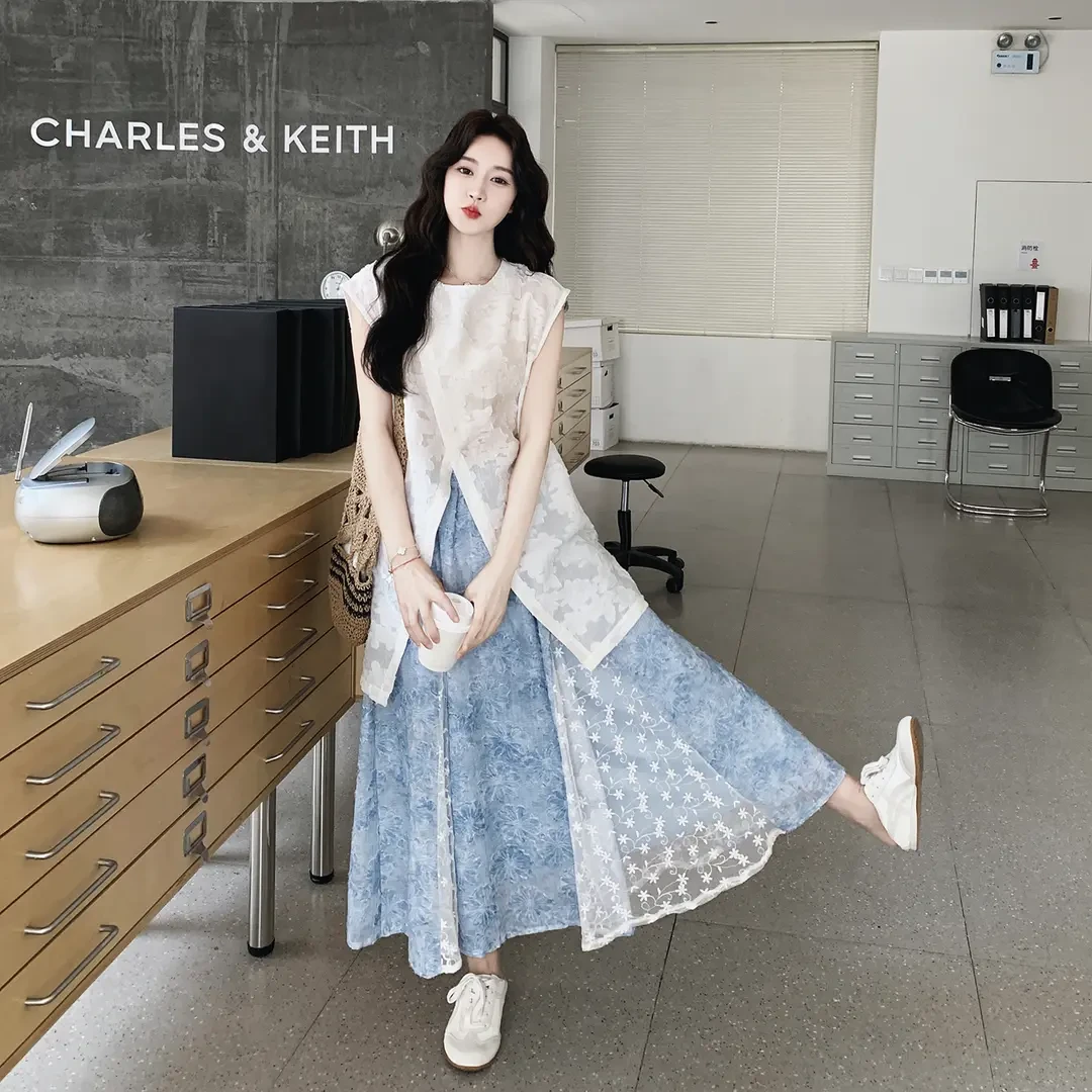 夏日高级氛围感时尚穿搭女2025新款超仙气质上衣蓝色半身裙两件套