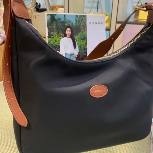 车缝线简约风纯色托特包单肩包百搭手拎包黑色饺子包