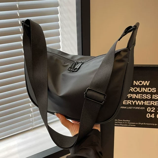 牛津布大容量包包女2025新款休闲运动斜挎包百搭通勤包单肩饺子包