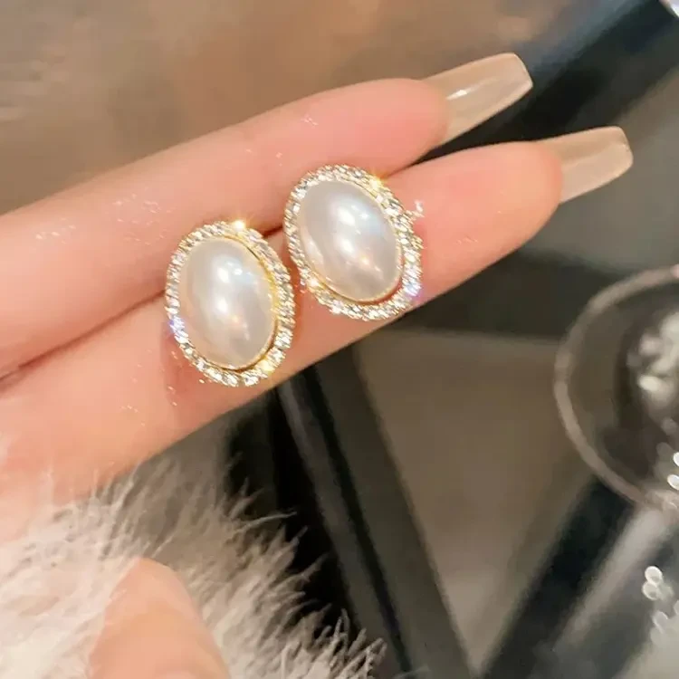 925银耳饰 925银耳饰 女椭圆珍珠耳钉轻奢小众高级感复古法式风