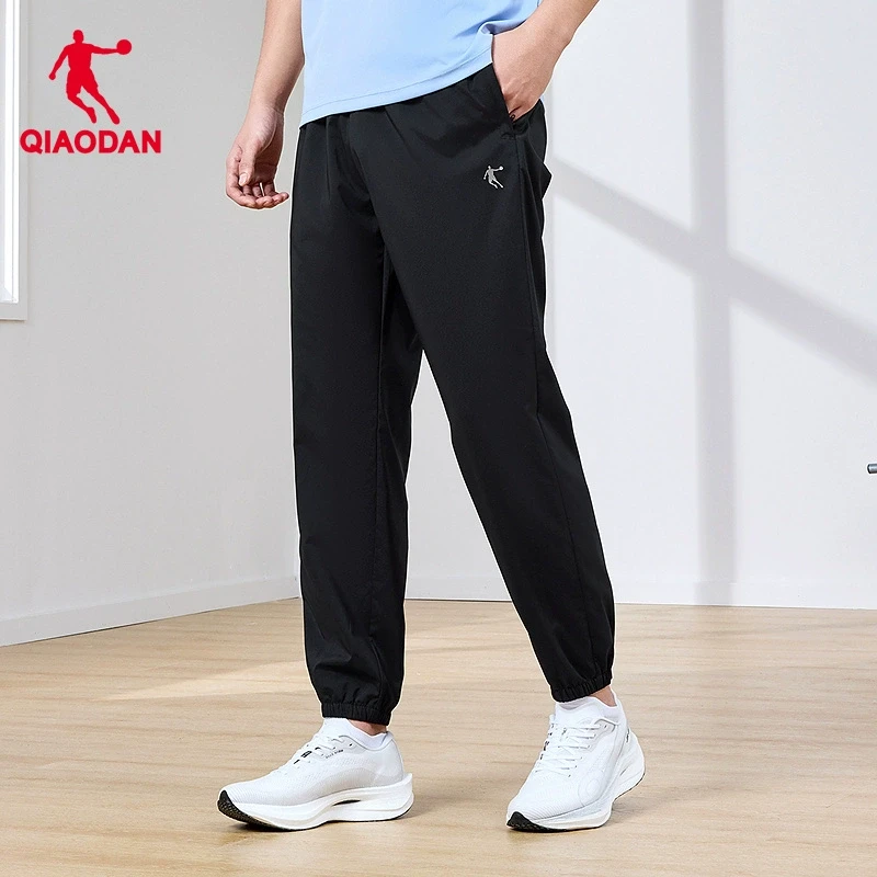 乔丹运动梭织长裤男士2025春季新款休闲收口宽松透气弹力