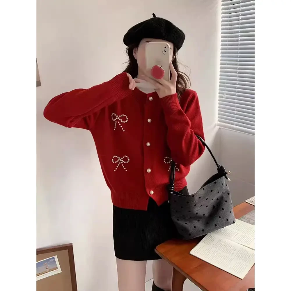 韩系温柔风甜美蝴蝶结钉珠毛衣外套女秋冬时尚洋气宽松显瘦针织衫