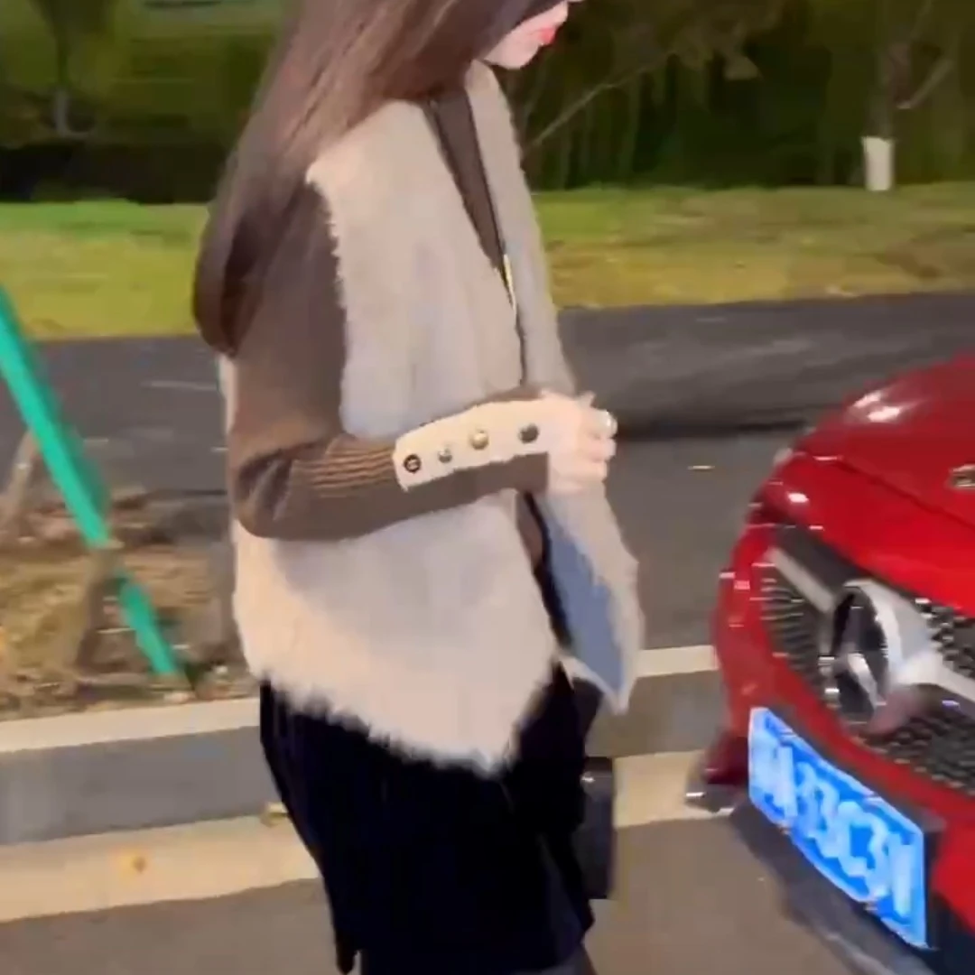 新款时尚洋气气质马甲打底衫黑色半身裙女装