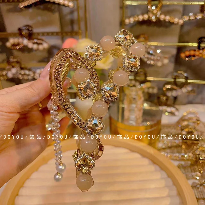 新款闪钻猫眼珠爱心大抓夹12公分轻奢重发量多工后脑勺盘发抓夹