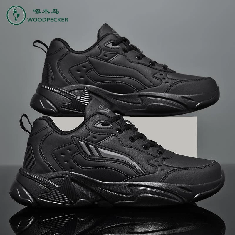 正品啄木鸟男鞋秋季皮面防水大码全黑色运动鞋男士轻便软底休闲