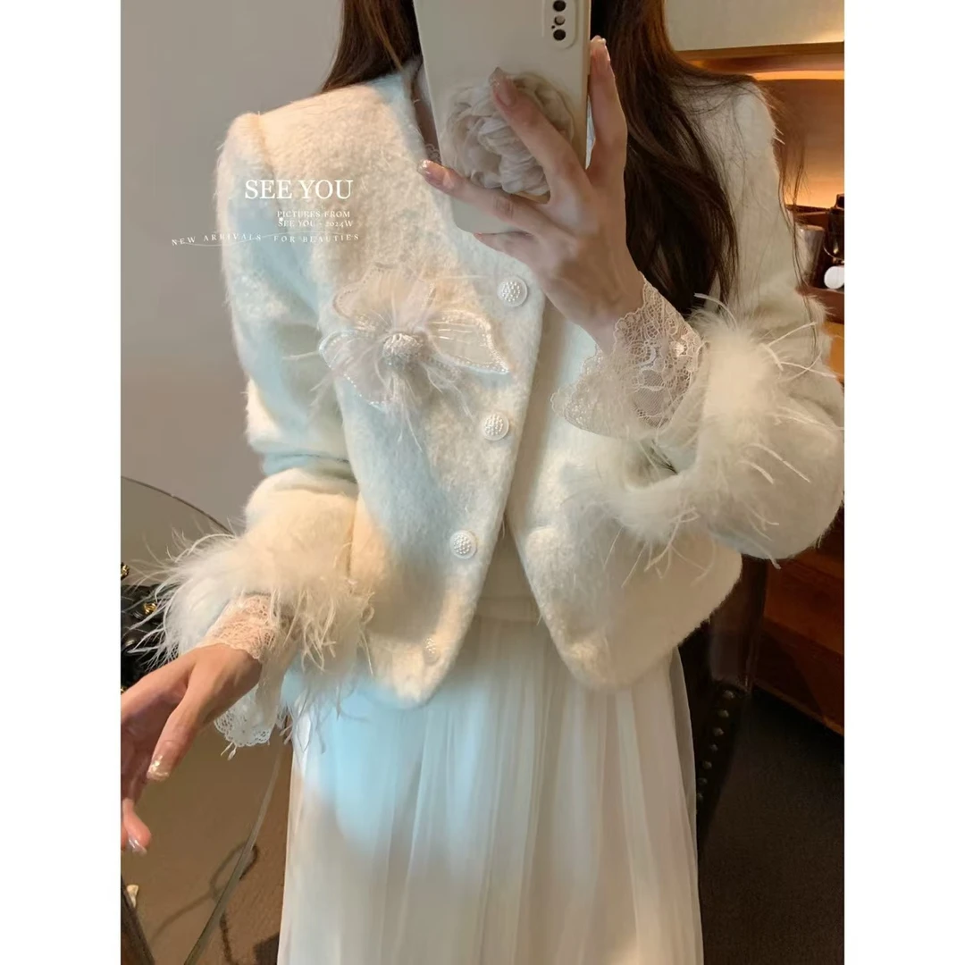 2024年秋冬新款羽绒小香风外套鸵鸟毛袖口甜美气质白色轻奢9881