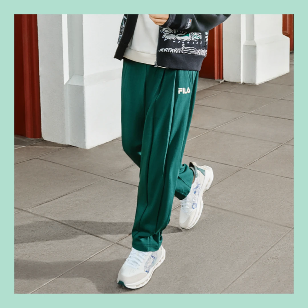 Fila/斐乐【街拍秀款】时尚休闲舒适敞口潮拍针织款长裤F11M418603F