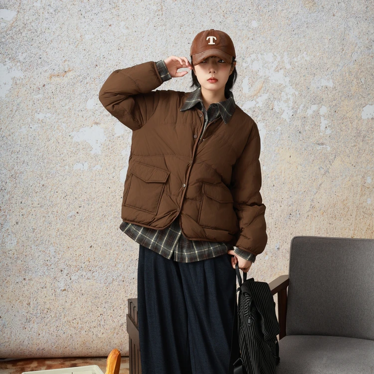 西町村屋假两件翻领拼接羽绒服女秋冬新款复古短款外套XX9D10007