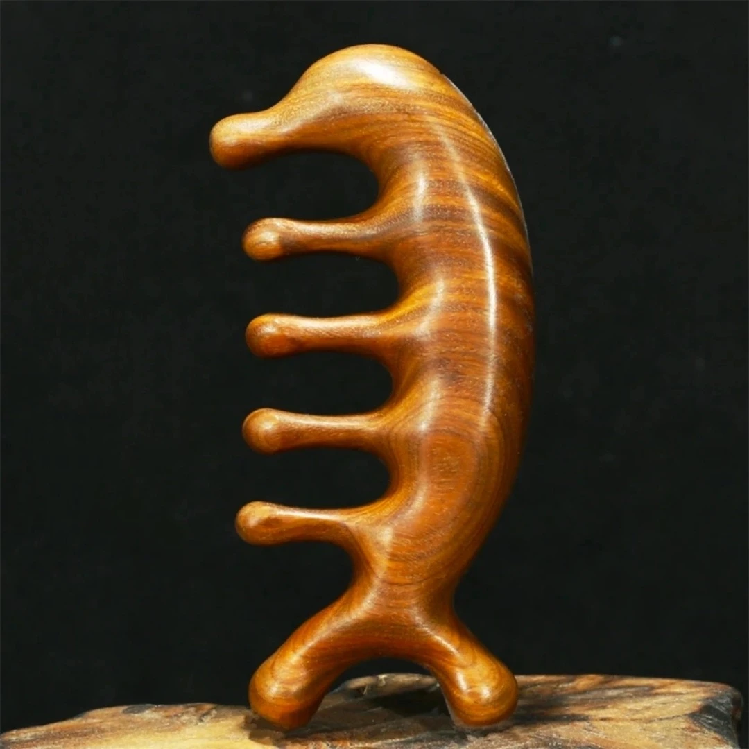 热卖小海豚绿檀头部面部颈部按摩梳经络梳眼周加厚宽齿女多功能