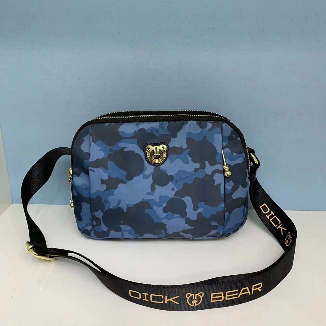 DICK BEAR/迪克熊9254新款时尚多隔层防水布料斜挎包