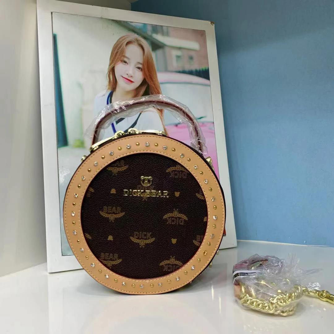 DICK BEAR/迪克熊9015新款加钻手提斜挎小圆包