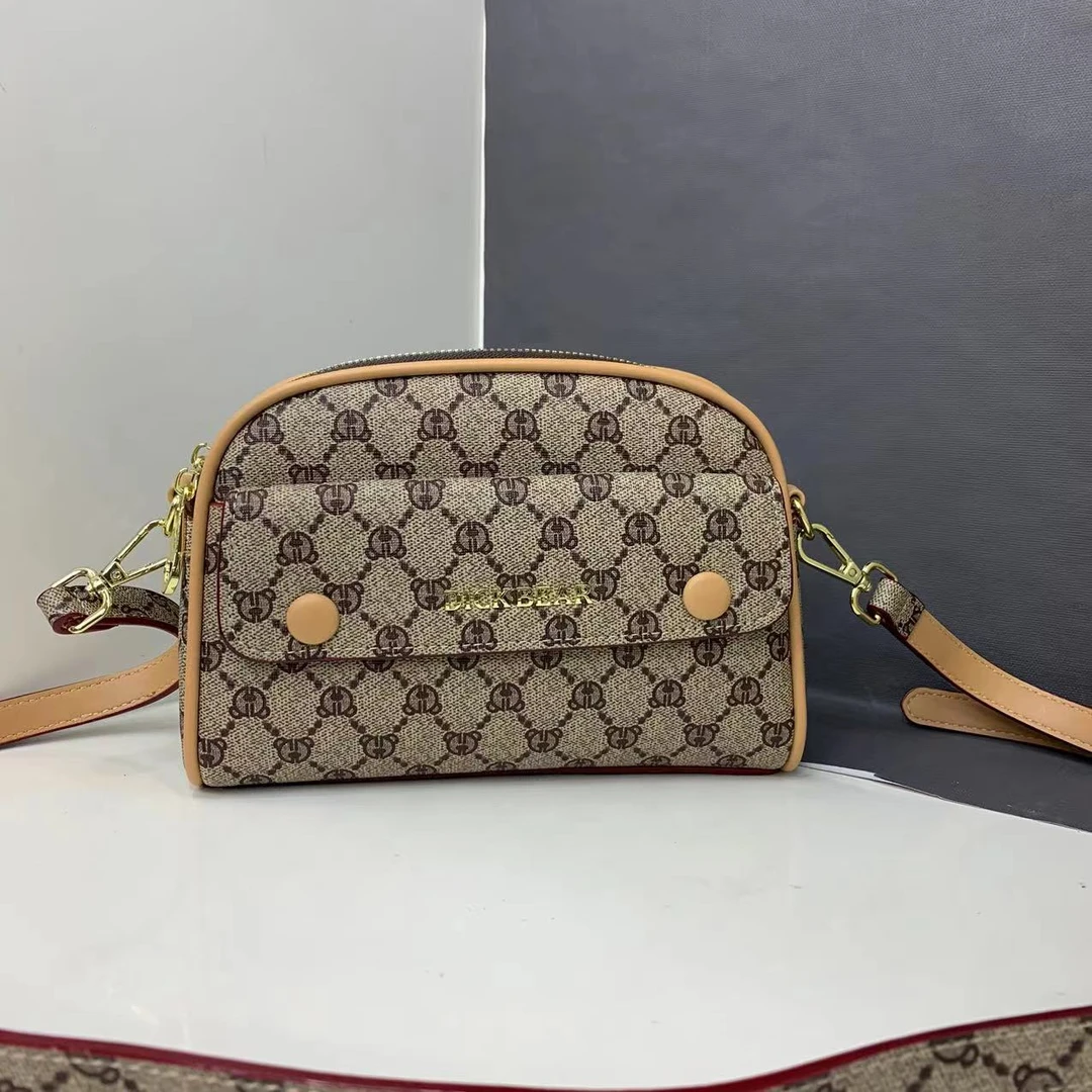 DICK BEAR/迪克熊9823新款时尚双拉链多隔层斜挎包小熊多层手机包