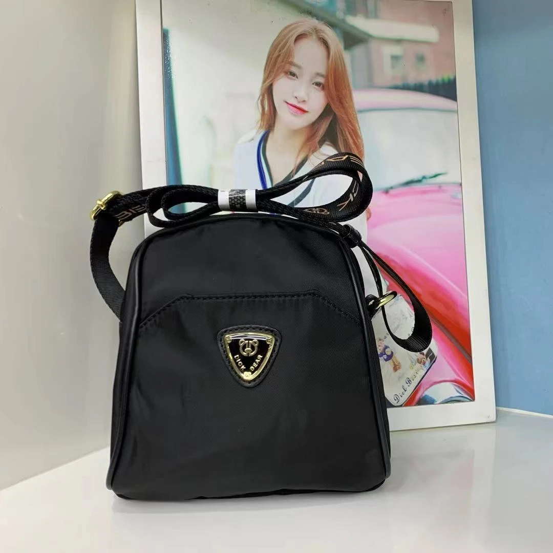 DICK BEAR/迪克熊9216新款时尚防水布料斜挎贝壳包