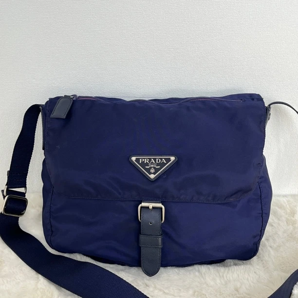 95新 Prada/普拉达 1556/男士深蓝色单肩