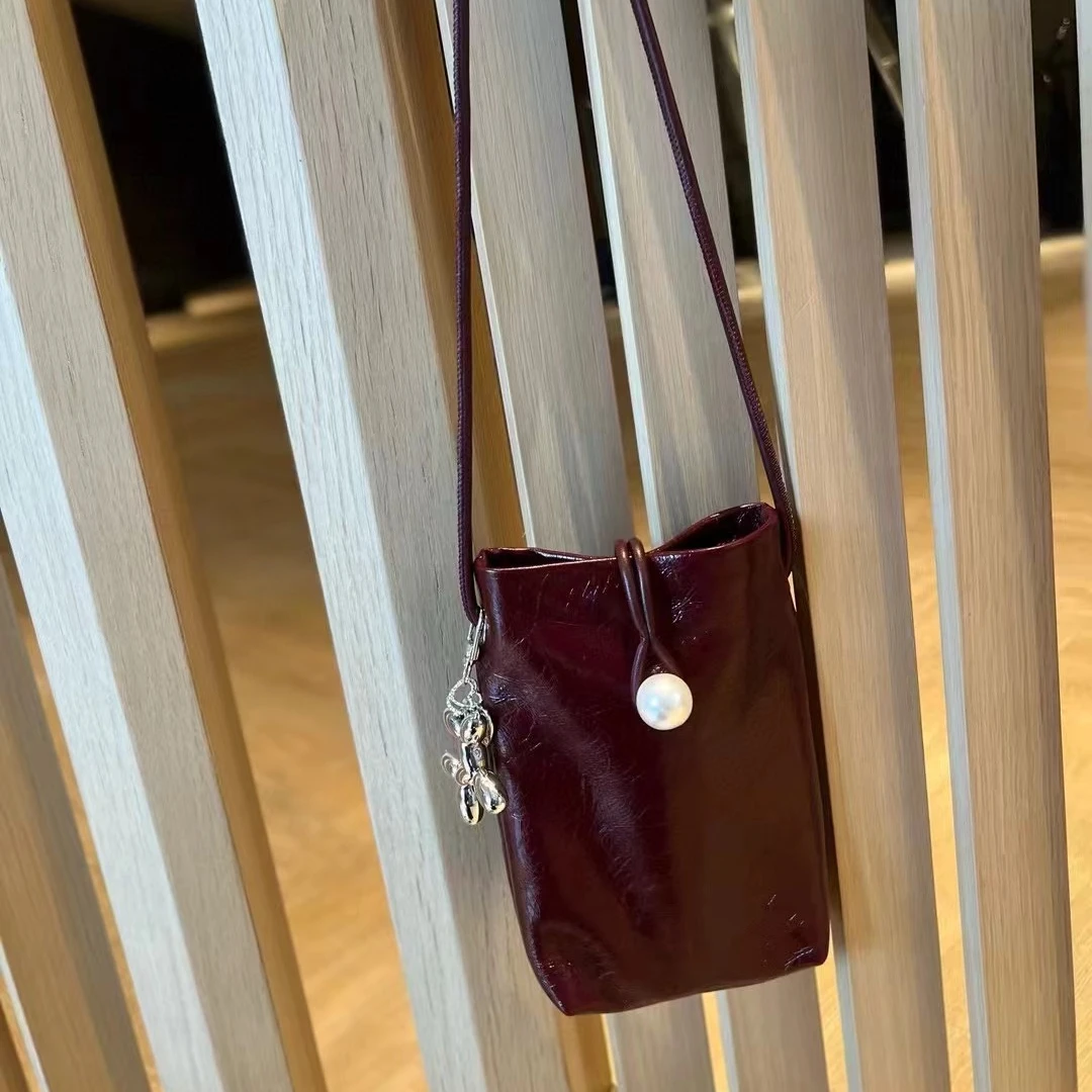 GUAIKEAI/乖可爱轻奢真皮时尚百搭小众小包包女士斜挎手机包