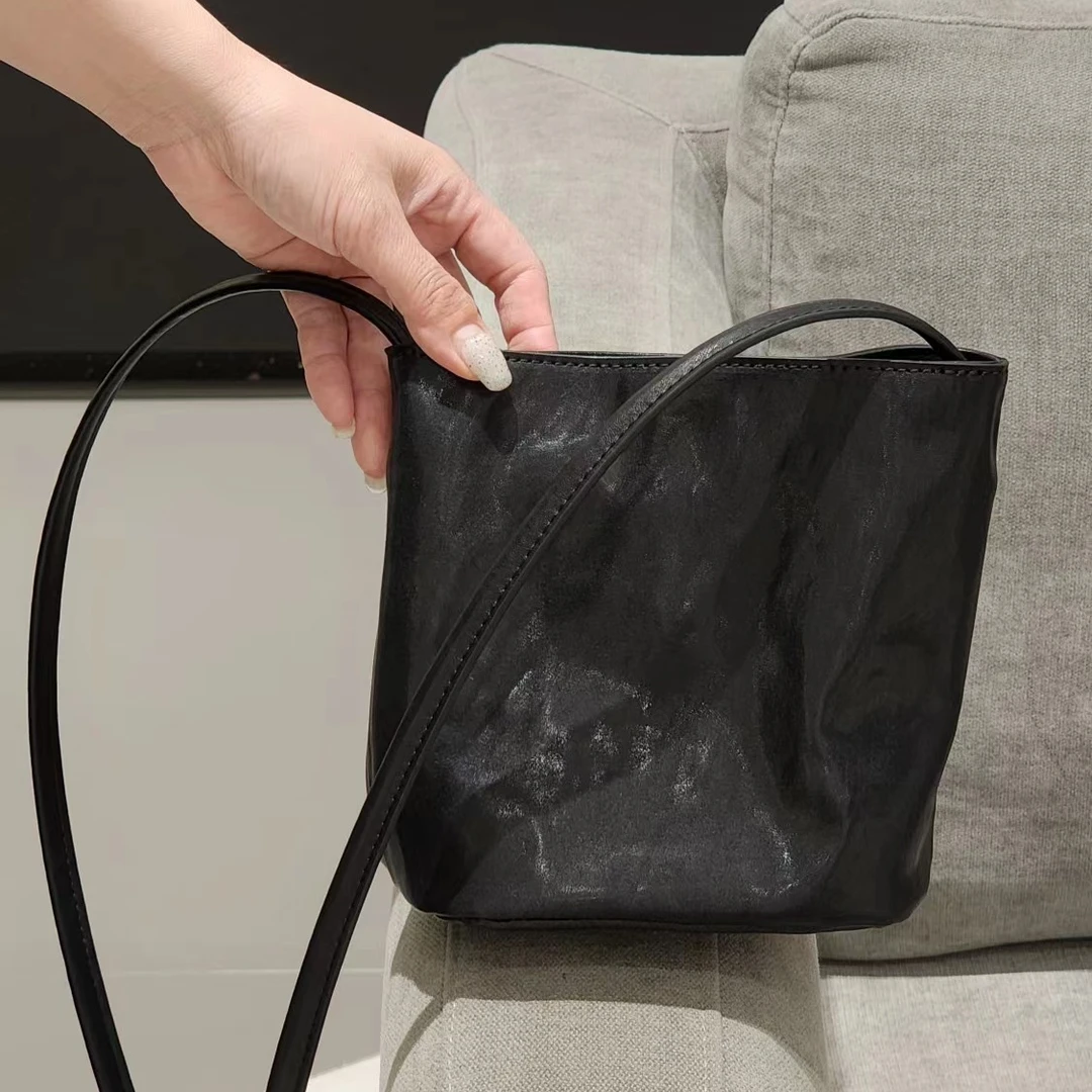 GUAIKEAI/乖可爱简约百搭植鞣牛皮水桶包时尚休闲单肩斜挎女包包