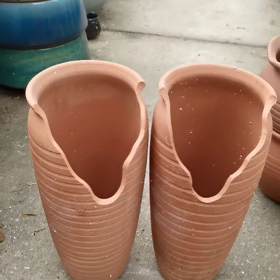 红陶20CM以下口13高32瑕疵