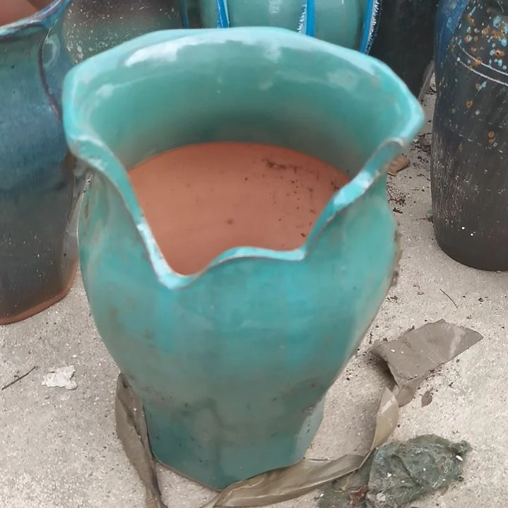 红陶20CM以下口19高27瑕疵