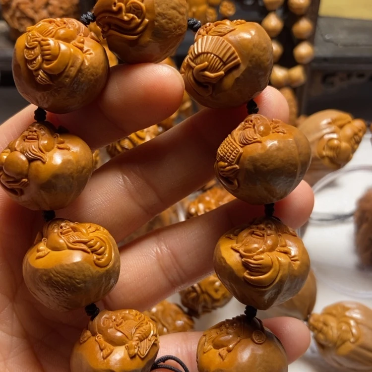 【闪购商品】橄榄核吊坠一**巴手工包衣财神2.34