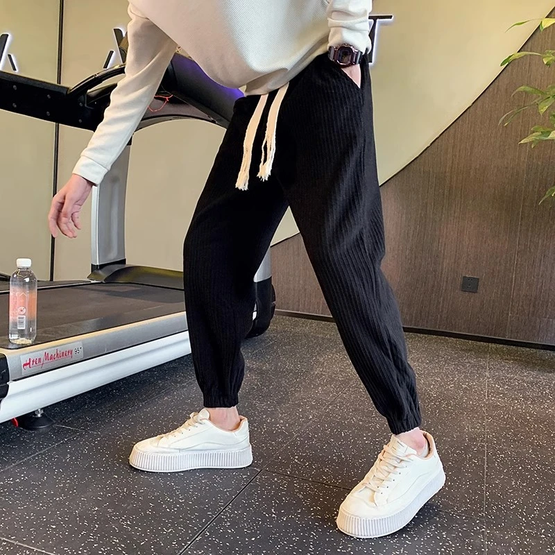 秋冬季高级感新款休闲卫裤男生潮流百搭修身小脚九分运动裤长裤男