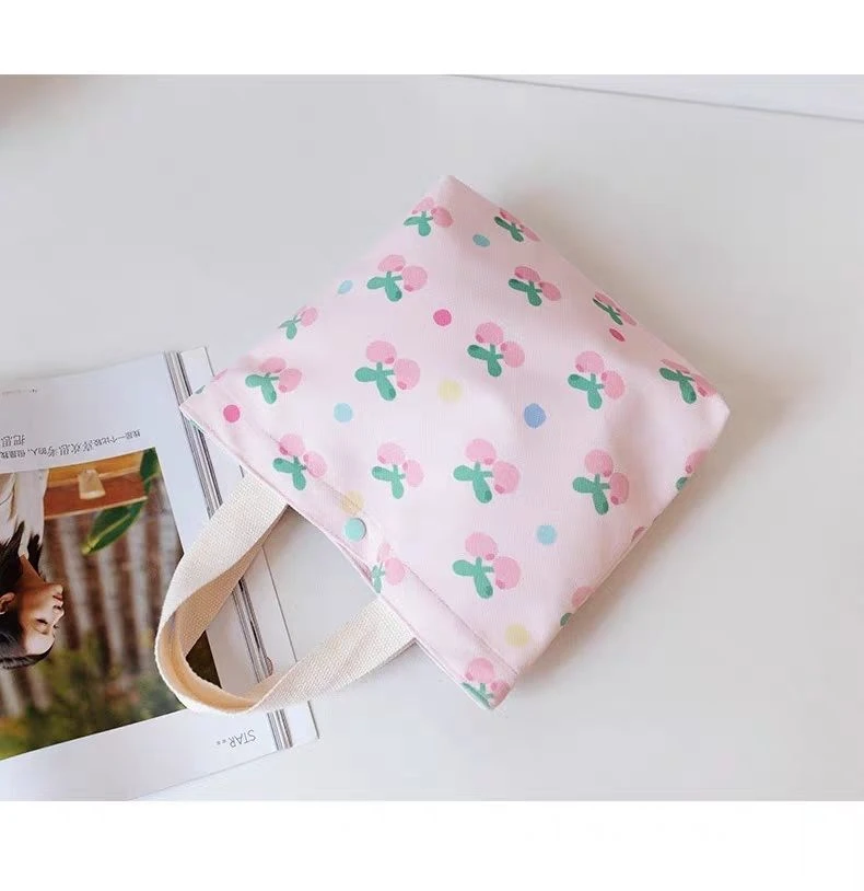 拉链手提包上班通勤纽扣手提包手拎便当包学生补习袋时尚包包材质