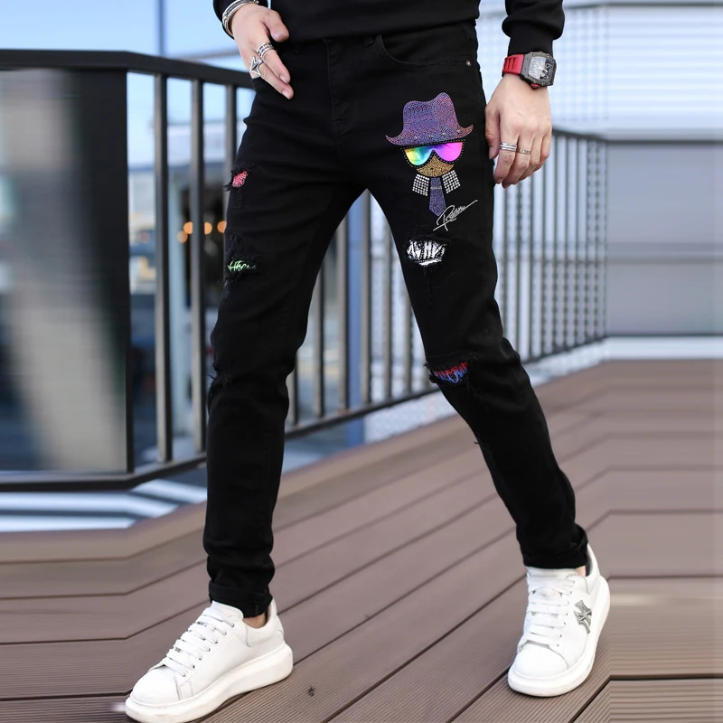 欧货2024春季男士修身破洞牛仔裤韩版个性潮流小人头烫钻小脚长裤